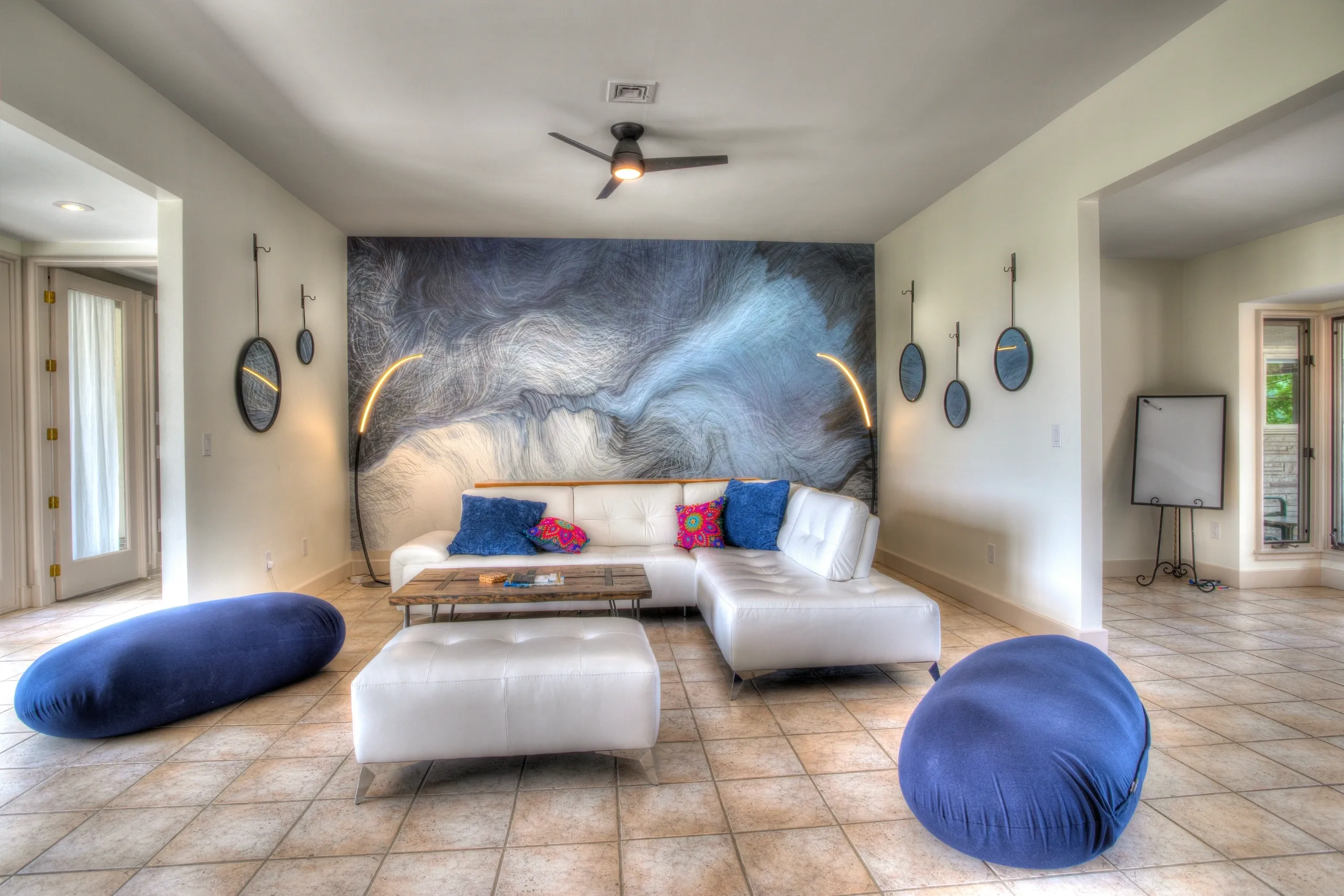 Modern living room with abstract wall art.