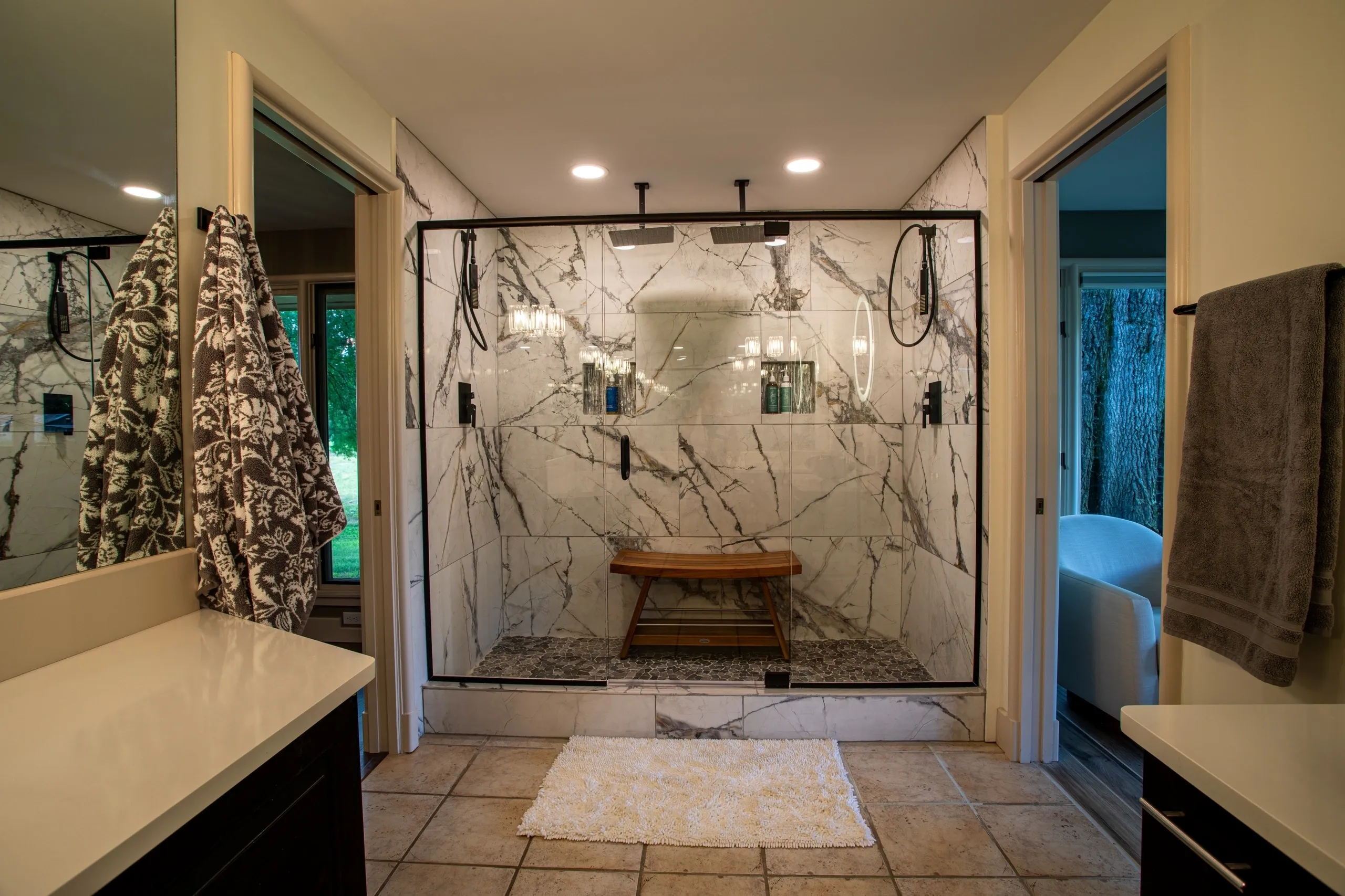 Luxurious bathroom with marble shower area.