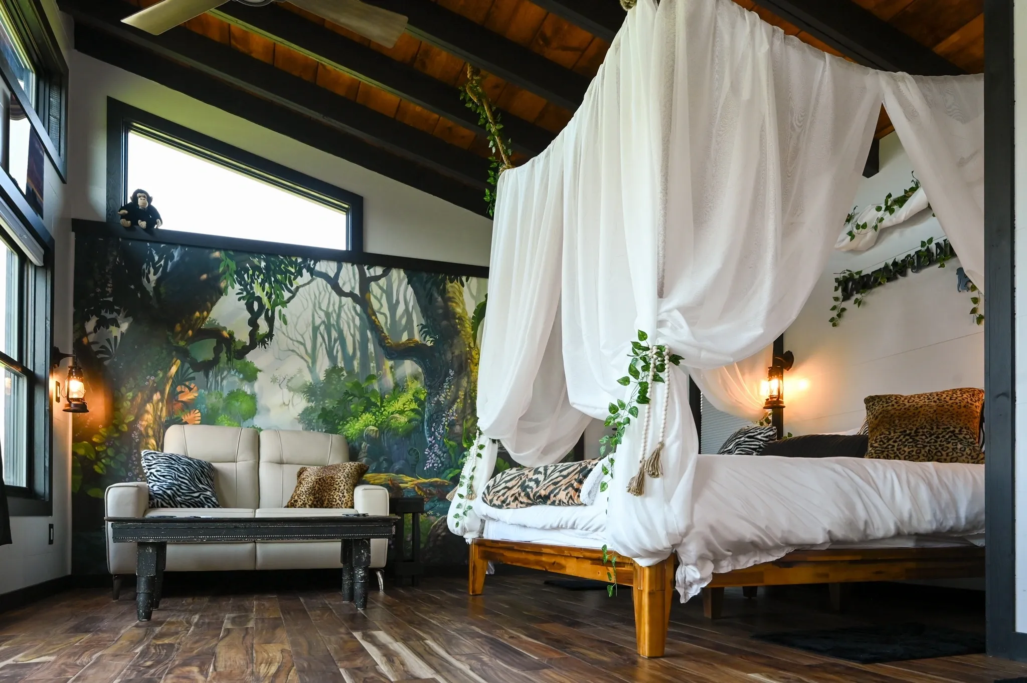 Tropical-themed bedroom with canopy bed.