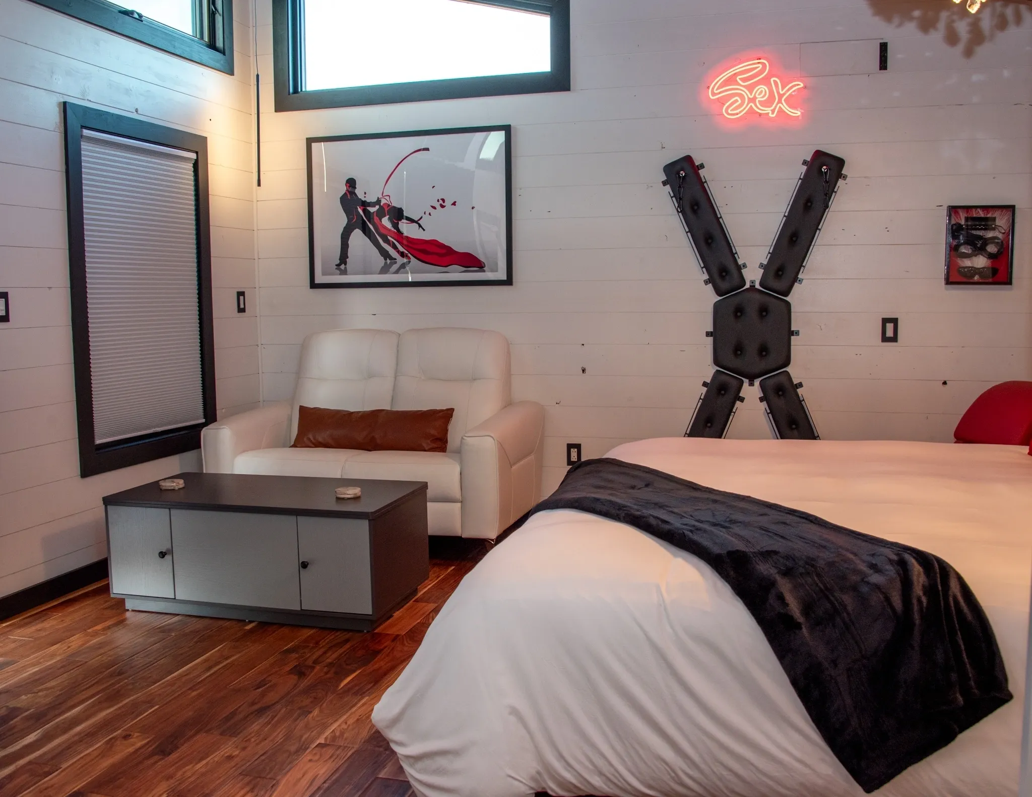 Modern bedroom with unique wall decor.